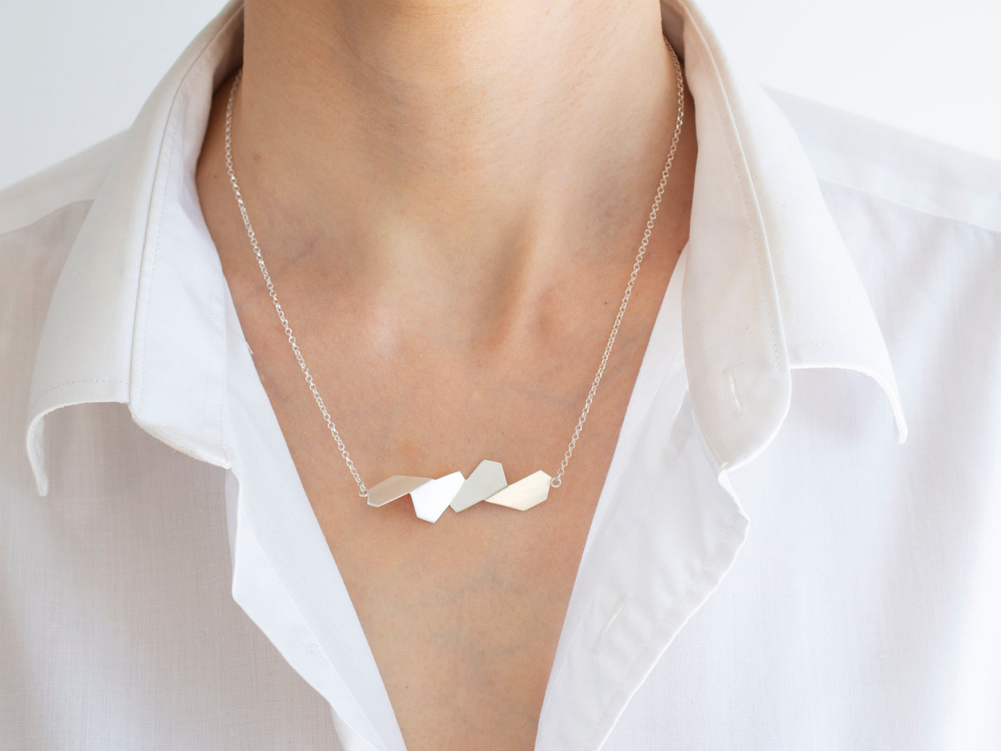 Linear geometric silver pendant necklace
