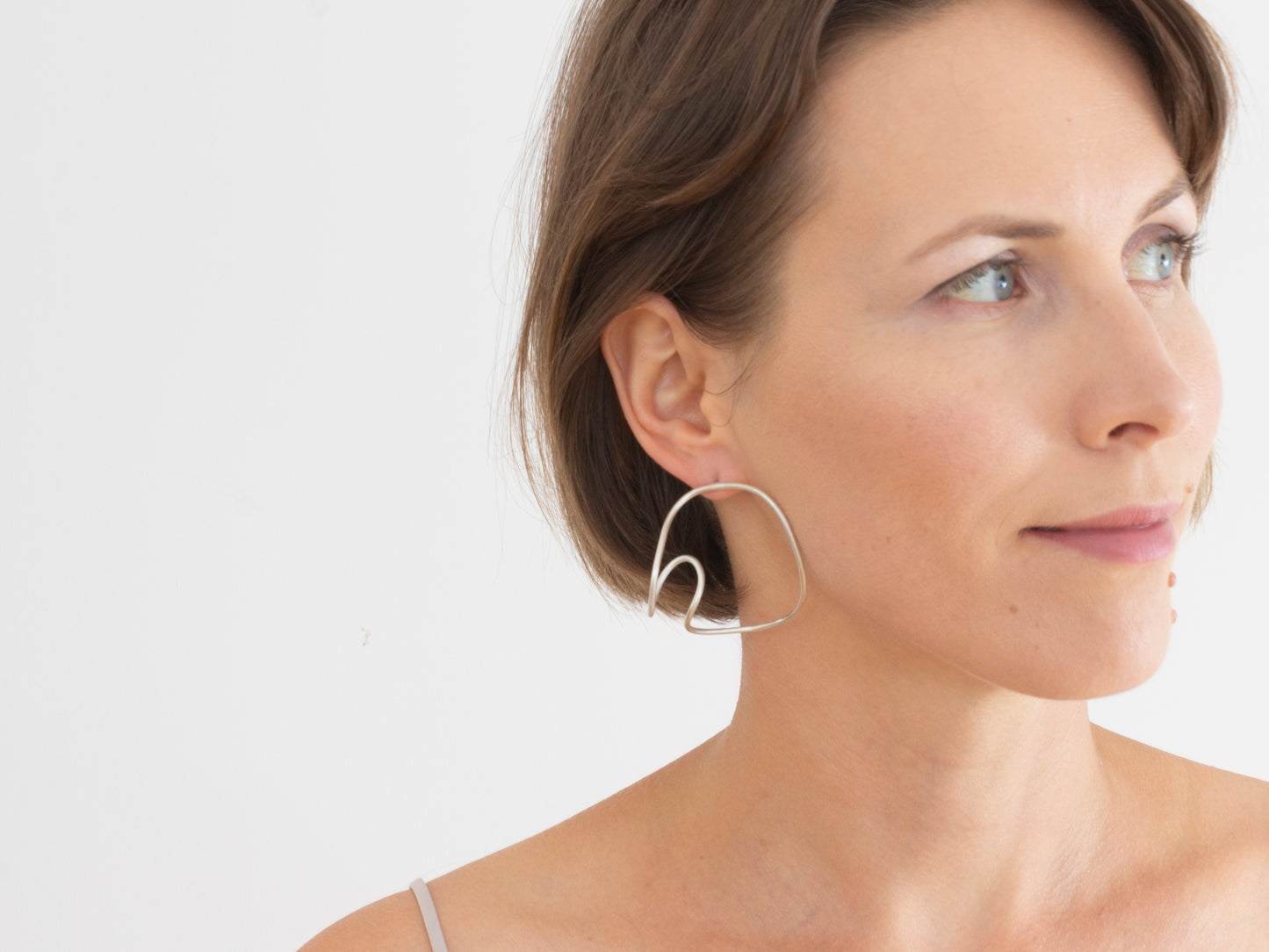 Minimalist statement silver earrings