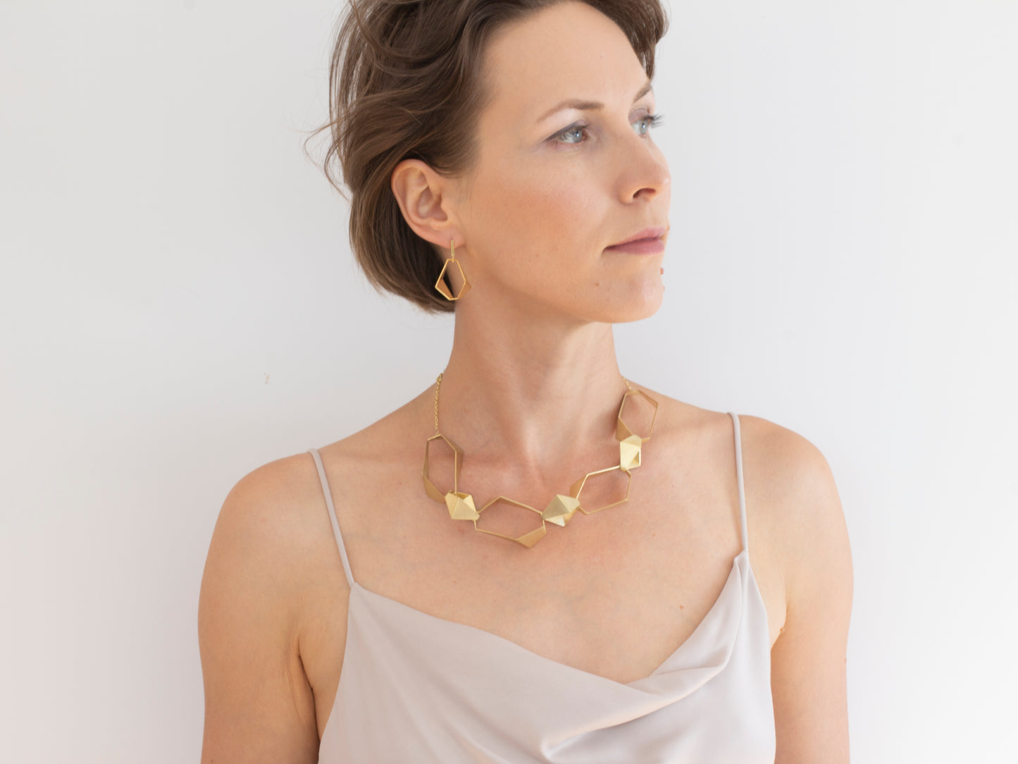 Gold statement geometric link necklace