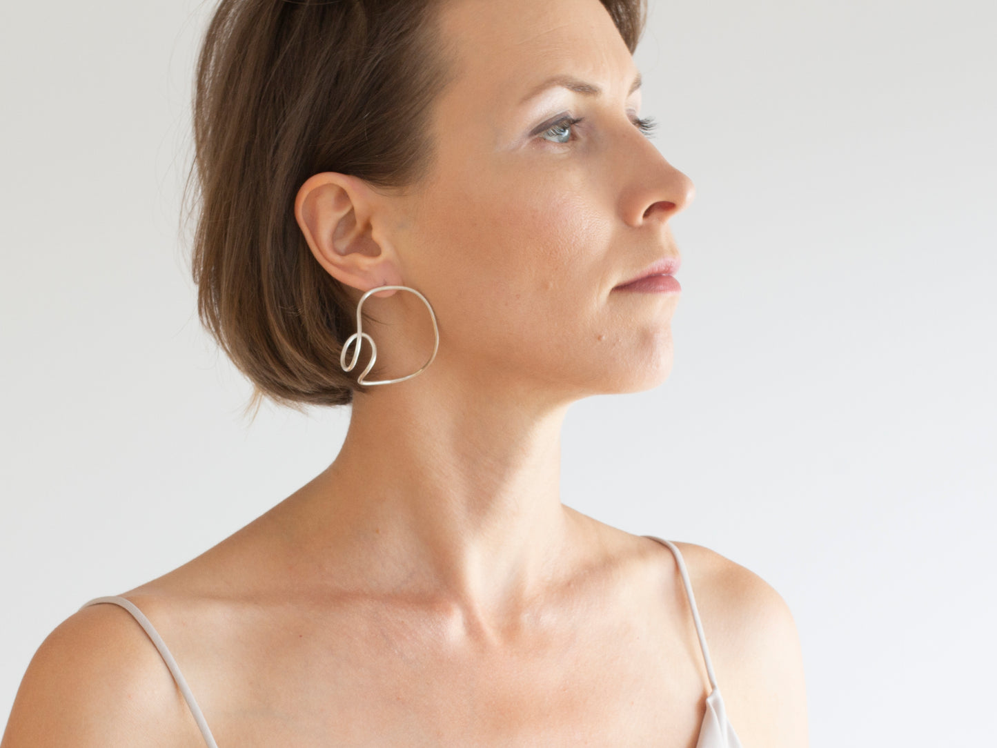 Minimalist statement silver earrings
