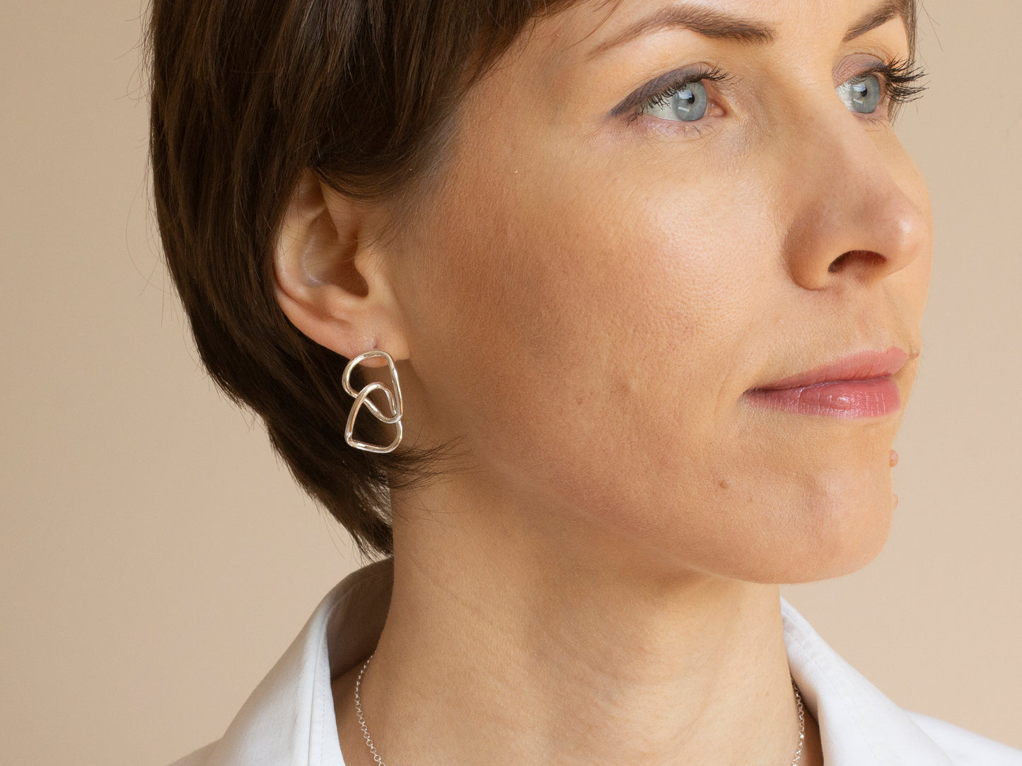 Interlinked silver earrings