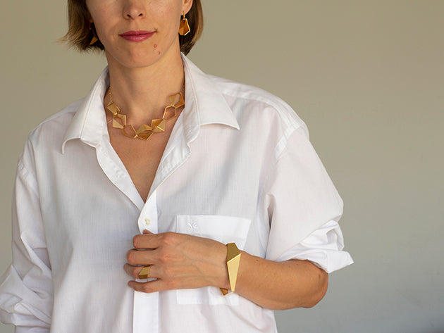 Bold jewelry in gold for confident women